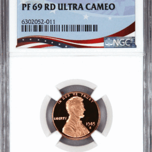 1985 graded penny in protective case.