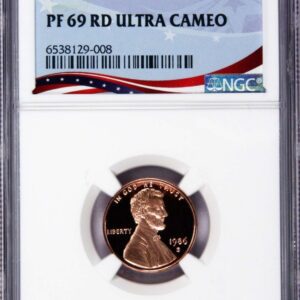 1986 penny in graded coin case.