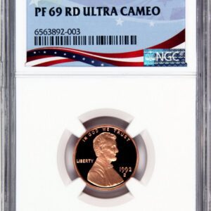 1992 graded penny in protective case.