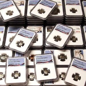 Stacks of collectible game cards featuring fantasy artwork and characters.