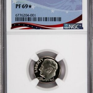 A graded 1969 Kennedy half dollar coin by NGC.