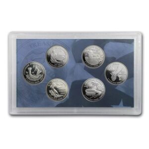 A set of six collectible coins featuring detailed designs in a protective case.