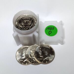 A set of shiny silver coins with a protective capsule and a 'Yes D' sticker.
