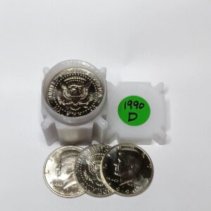 A collection of 1960 Kennedy half-dollar coins in protective cases.